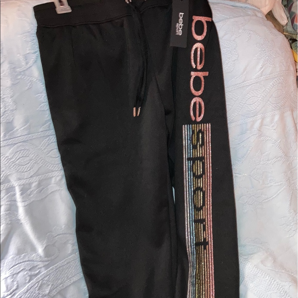 🌈 Cute!! NWT Bebe sport joggers. Black with rainbow glitter logo down left leg
